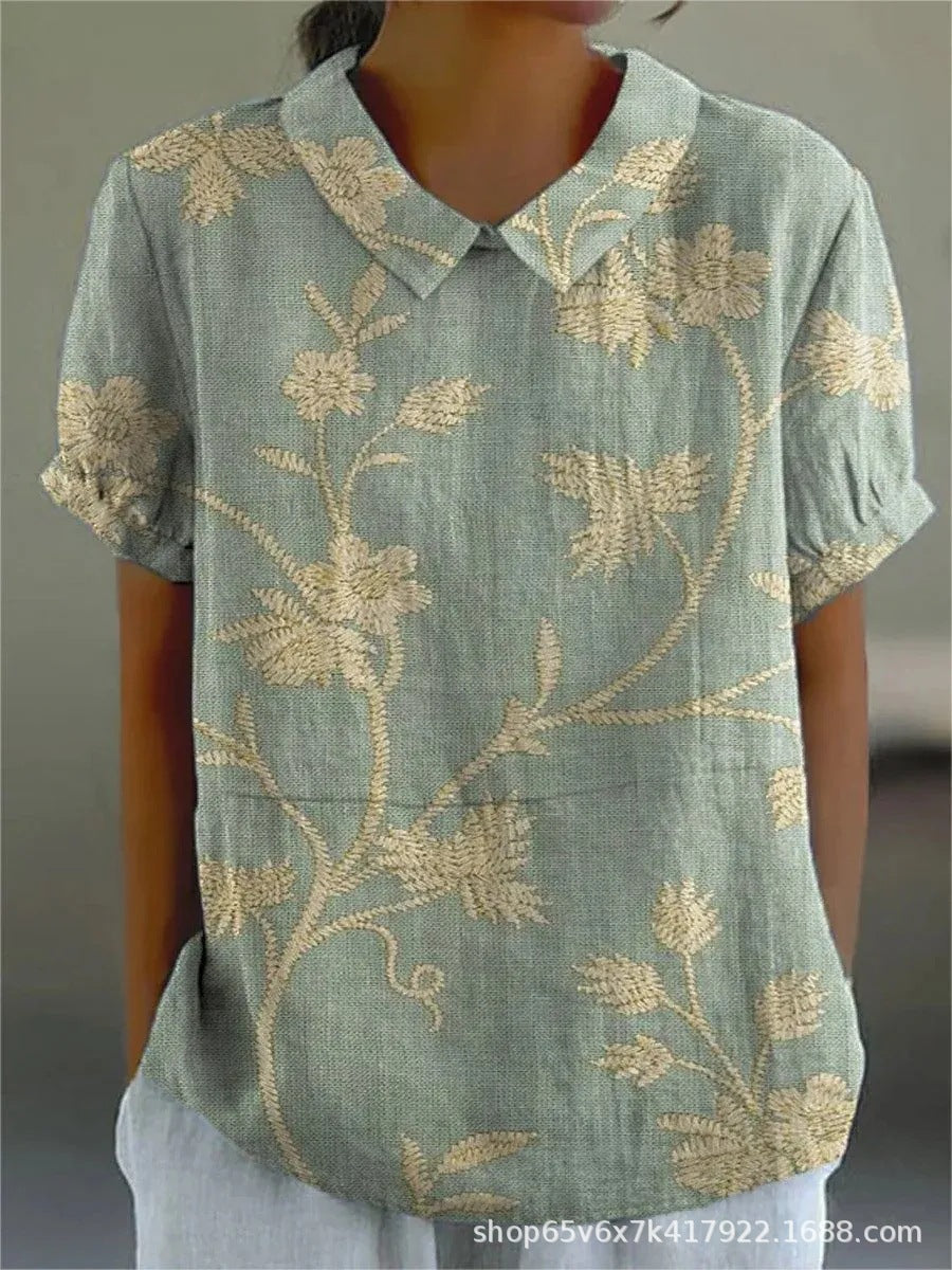 Damen Langarm Bluse mit lebhaftem Blumendruck für legere Frühlings- und Sommeroutfits.