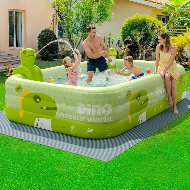 Kleinkind-Planschbecken mit integriertem UV-Schutz und lustigem Dinosaurier-Wassersprüher.