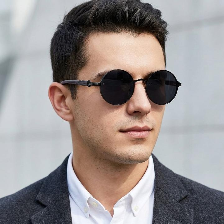 Runde Retro Sonnenbrille mit UV400 Schutz für Damen & Herren, elegantes Metallgestell.