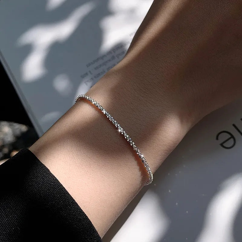 Elegantes Damenarmband aus 925er Sterling Silber, filigran, wellenförmig, wasser inspiriert.