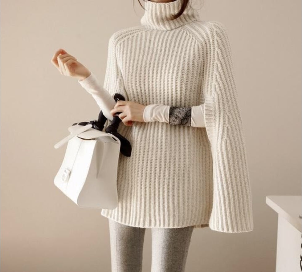 Nahaufnahme des kuscheligen Materials vom Damen Winter Set; weicher Rollkragenpullover und Hose für maximalen Komfort.