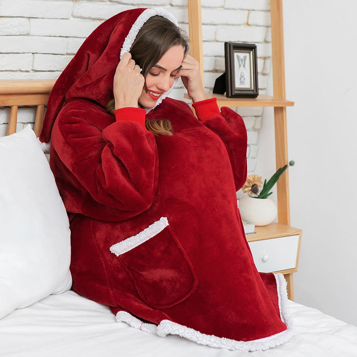 Vielseitige Unisex Decke mit Kapuze, als warmer Hoodie oder gemütliche Wohndecke nutzbar.