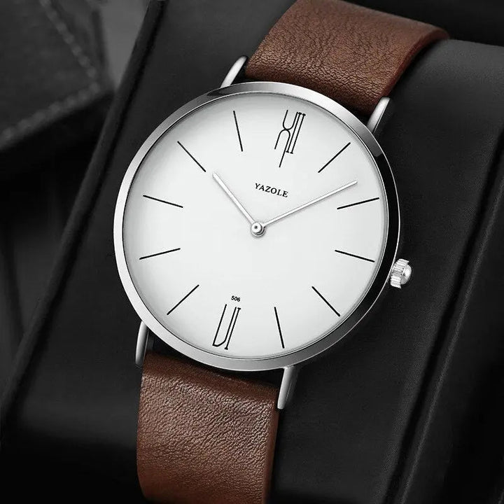 Herren Armbanduhr mit elegantem Lederarmband. Zeitloser Klassiker für stilvolle Herren.