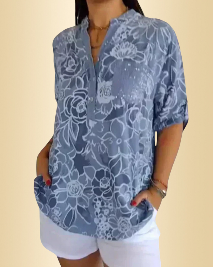 Leichte, luftige Damen Blumenbluse mit lockerem Schnitt und Blumenmuster, ideal für Sommer & Frühling.