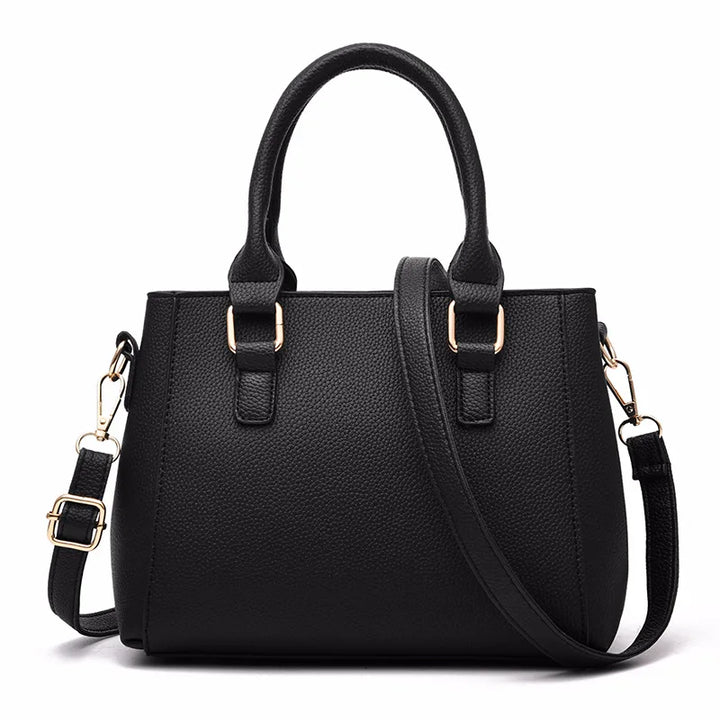 Elegante rosa Damen Ledertasche mit floraler Stickerei; vielseitiges Accessoire als Schulter- oder Handtasche.