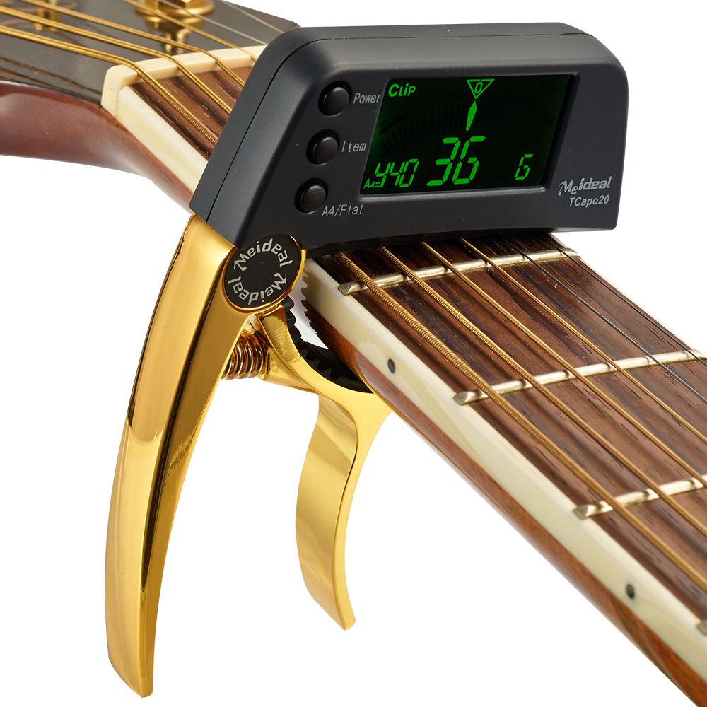 Innovatives Gitarren Musikzubehör: Capo mit integriertem digitalen Tuner. Schnelles und genaues Stimmen.