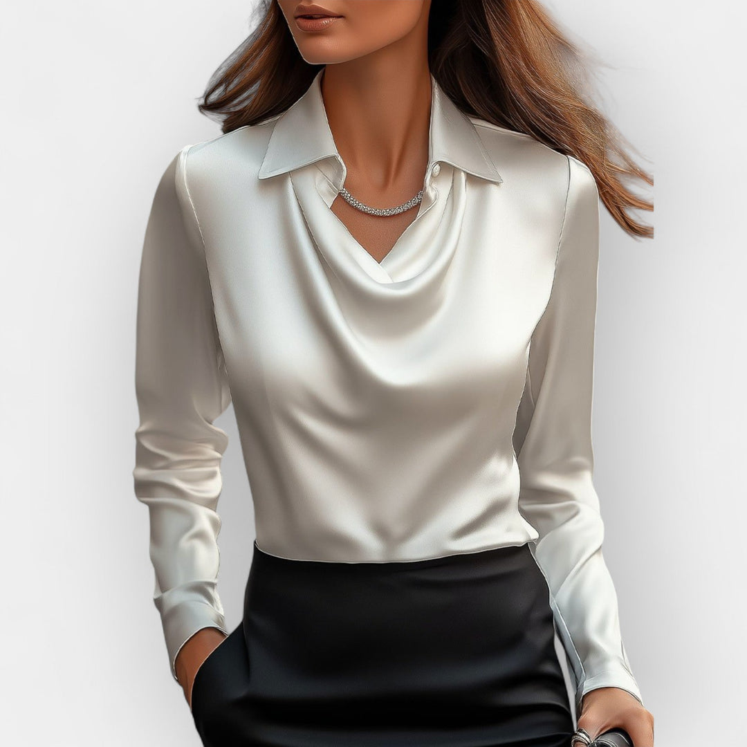 Damen Hemdbluse mit elegantem Wasserfallkragen. Stilvolle Langarmbluse für Business & Freizeit.