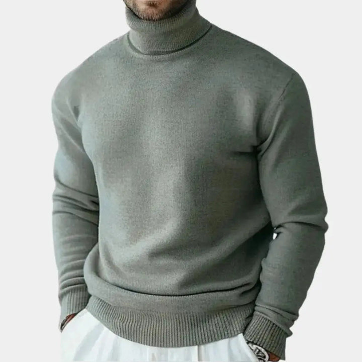 Schwarzer Herren Rollkragenpullover, elegant und warm. Ideal für Wintermode und stilvolle Freizeitlooks.