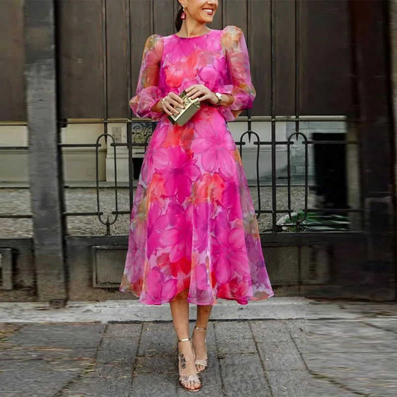 Elegantes Damen Hochzeitsgast Midi-Kleid mit romantischem Blumenmuster und Puffärmeln in A-Linie für Frühling/Sommer.