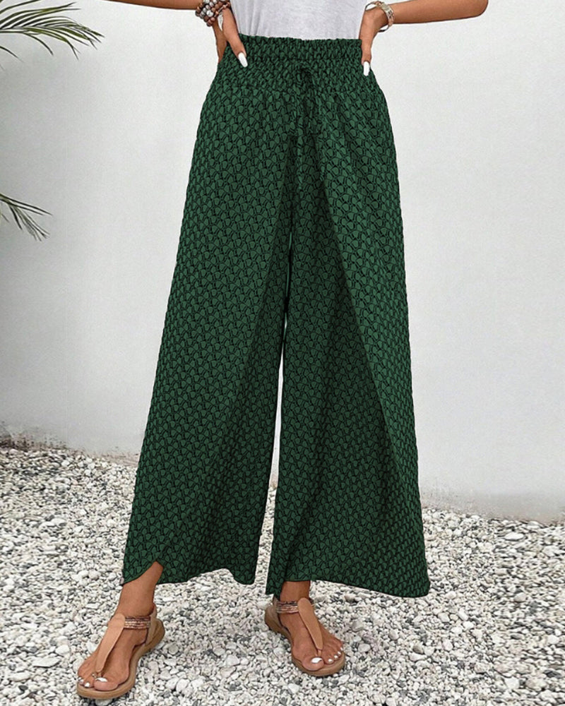 Palazzo Damenhose im Boho-Stil mit geometrischem Muster in Rot, Grün, Schwarz. Bequem für Sommer-Freizeit.