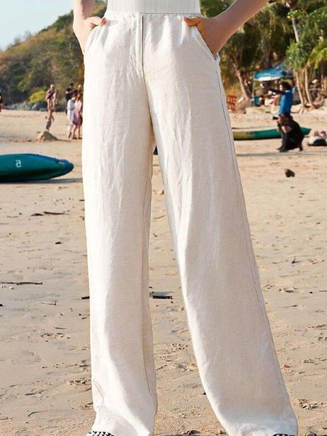 Weiße Damen-Freizeithose mit hoher Taille & weitem Bein; ideal für elegante Frühlings- und Sommer-Casual-Outfits.