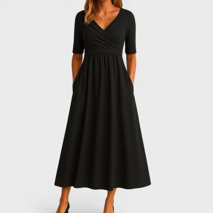 Modisches Wickelkleid Elsa für Damen mit V-Ausschnitt, figurumspielendem Schnitt, ideal als Abendkleid.