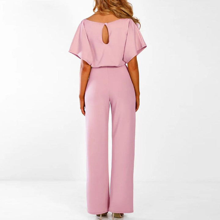 Modischer Damen Jumpsuit mit Bindegürtel & weitem Bein. Vielseitiger Einteiler für jeden Anlass.