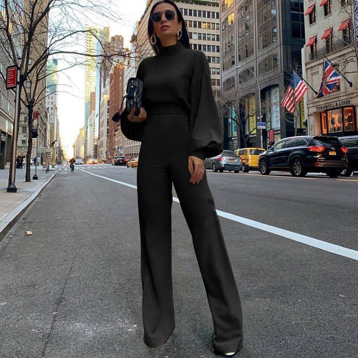 Gelber Damen Jumpsuit, elegant mit Puffärmeln & weitem Bein, ein Statement-Piece für moderne Frauen und besondere Events.