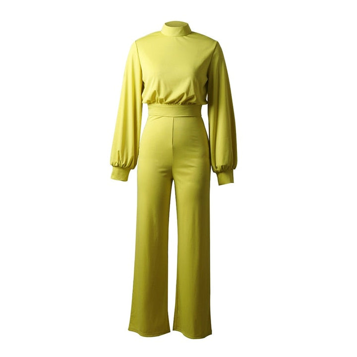 Moderner Damen Jumpsuit in Schwarz mit Puffärmeln & weitem Bein für einen eleganten Power-Look, ideal für Business & Feiern.