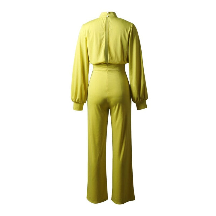 Festlicher Damen Jumpsuit mit voluminösen Puffärmeln und fließendem, weitem Bein, perfekt für elegante Abendmode.