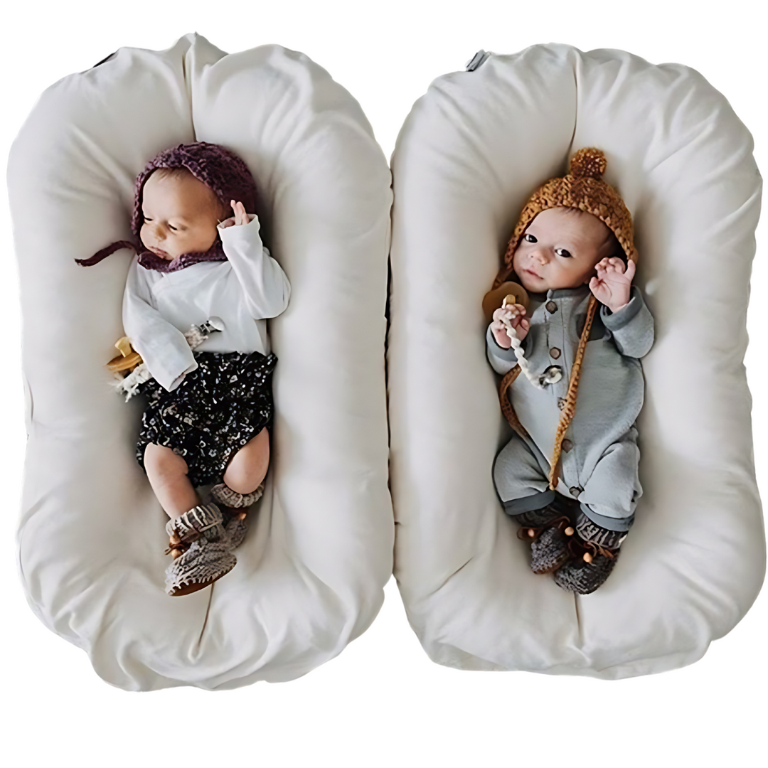 Weiches Babynest aus 100% Baumwolle, atmungsaktiv & sicher für Babys Schlaf.