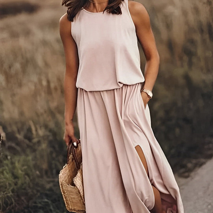Beiges Retro-Muster Maxikleid für Damen, ärmellos und fließend. Ideal für warme Sommertage.