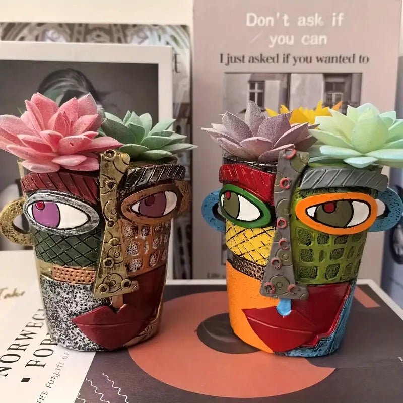 Handgefertigter Künstler-Blumentopf mit ausdrucksstarkem Gesichtsdesign, ein Blickfang für jedes Zuhause.