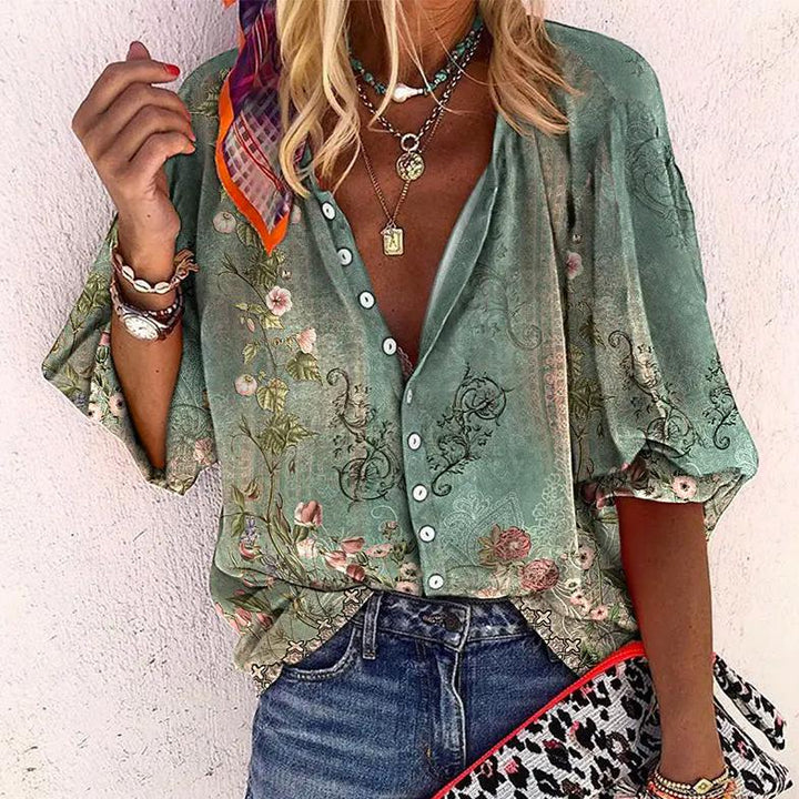 Elegante Damen Sommerbluse mit Blumenprint und weiten Ärmeln. Luftige Boho Bluse für Frauen.