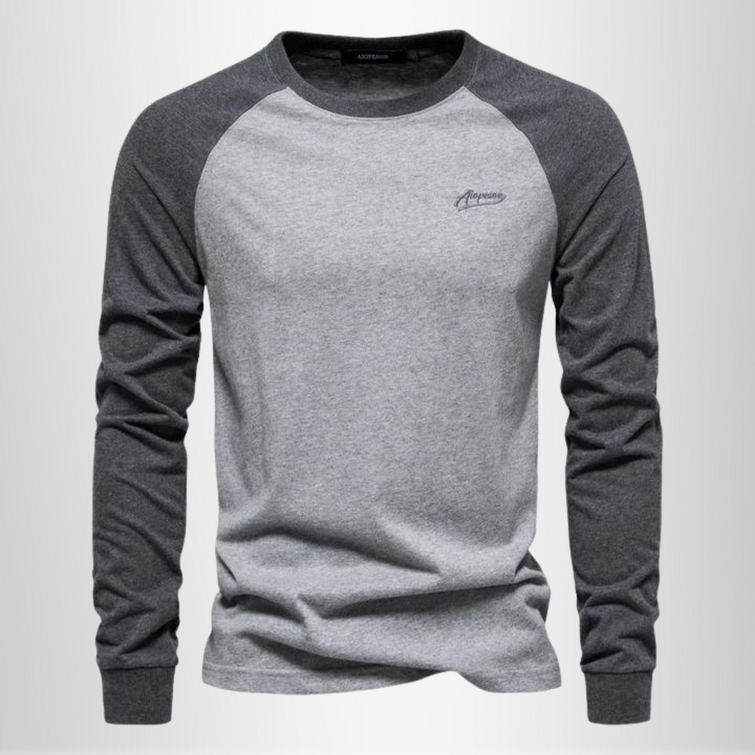 Herren Langarmshirt im komfortablen Raglan-Style für Alltag & Freizeit. Vielseitiges Basic Oberteil mit Rundhals.