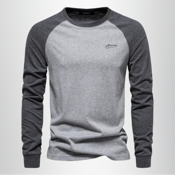 Herren Langarmshirt im komfortablen Raglan-Style für Alltag & Freizeit. Vielseitiges Basic Oberteil mit Rundhals.