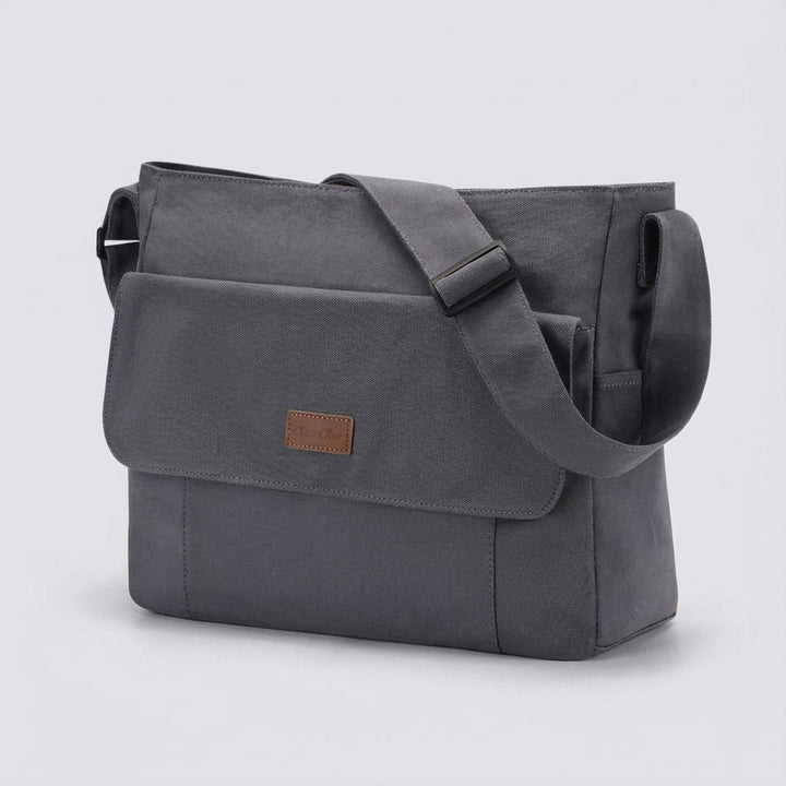 Praktische Unisex Laptop-Schultertasche in Schwarz, leicht, robust, mit vielen Fächern für Arbeit und Freizeit.