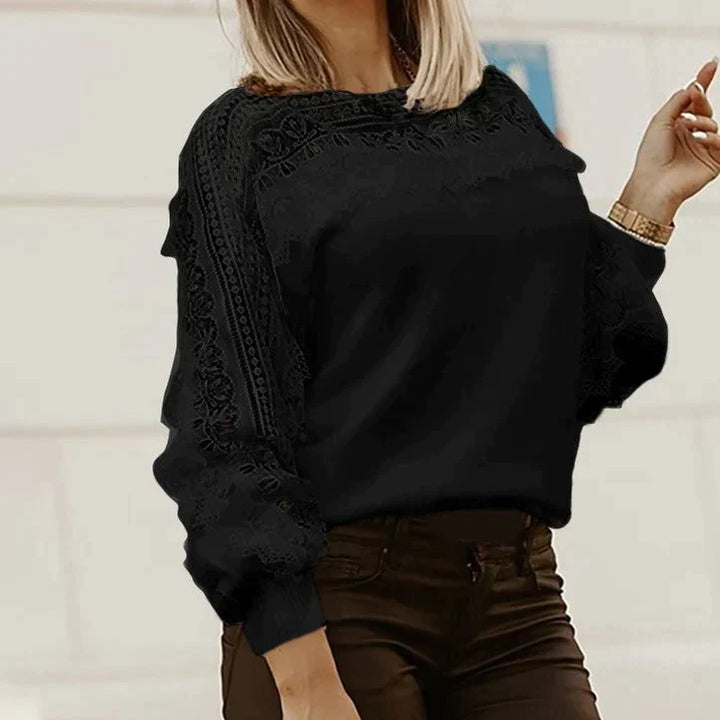 Feminine, elegante Damenbluse mit Spitzenbesatz und modischen Puffärmeln, ein Must-have für Herbst- & Wintermode.