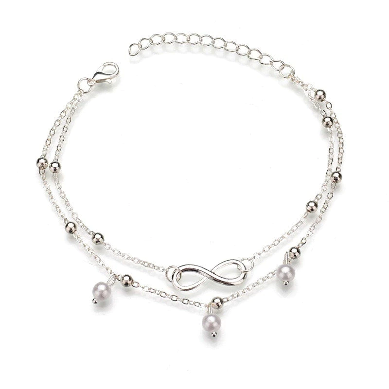 Stilvolles Damen Fußkettchen mit Retro-Perlen und Unendlichkeitssymbol. Perfektes Geschenk oder Sommer-Accessoire.