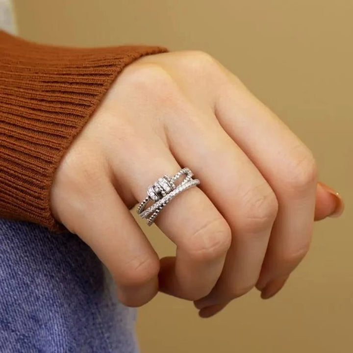 Trendiger Zirkonium Angstlöser-Ring für Damen und Herren; beruhigender Drehring für mehr Wohlbefinden.