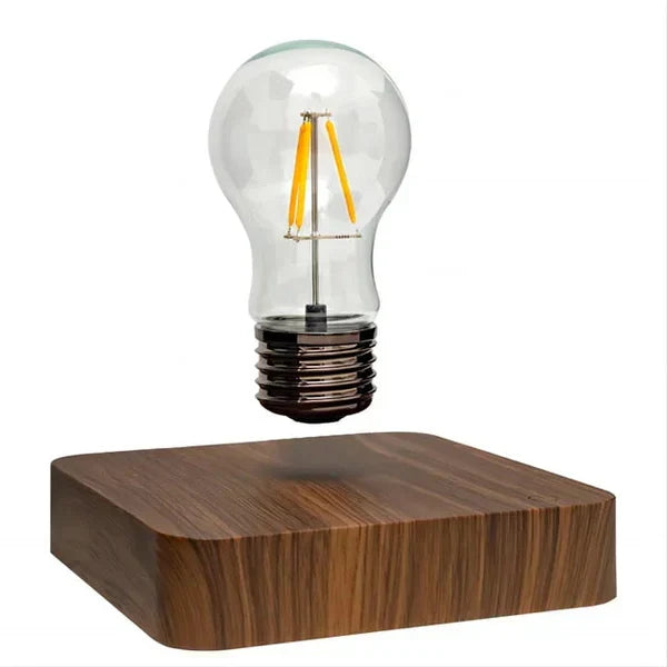 Elegante Geschenkidee: Schwebende LED-Lampe Floatique aus Walnussholz für warmes Ambiente Licht.