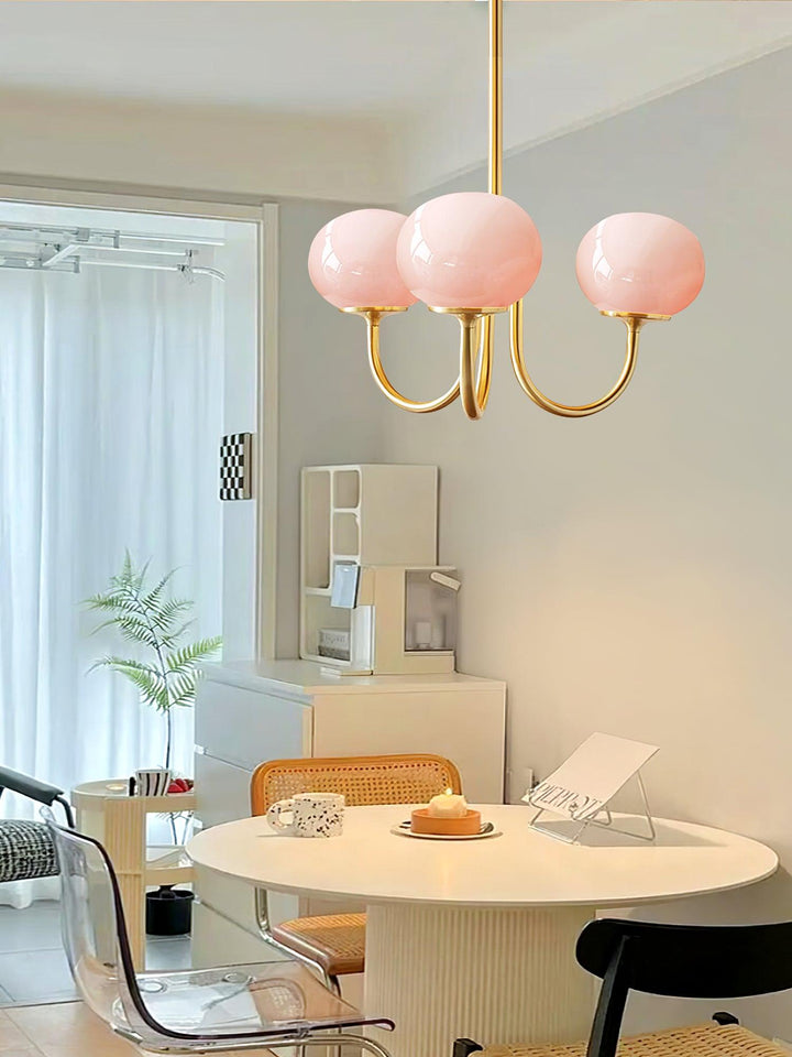 Moderner Kronleuchter in Chrom-Optik mit klarem Glas.