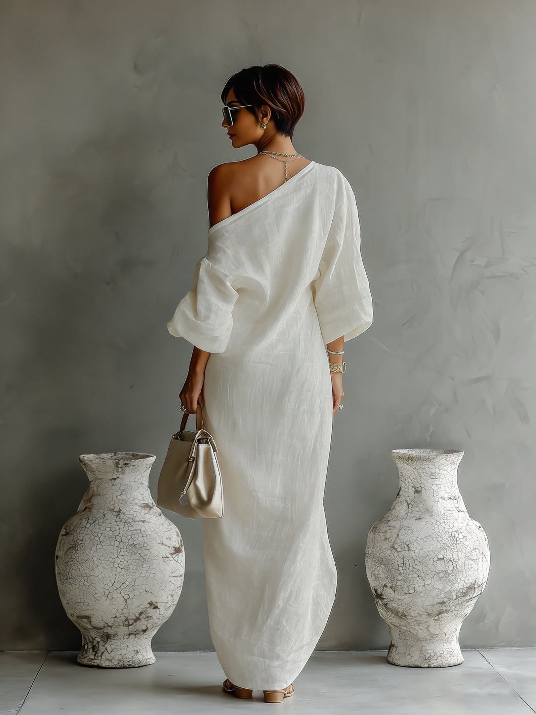 Stilvolles, asymmetrisches Damen Maxi Kleid mit One-Shoulder und modernem Volumen-Ärmel für Abend & Gala.