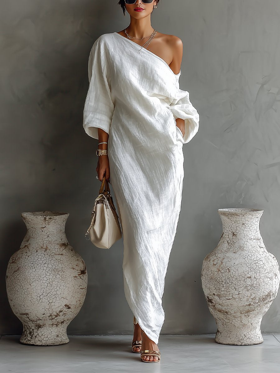Exquisites Damen Abendkleid, Maxi-Länge, One-Shoulder Design mit einem opulenten Volumen-Ärmel, perfekt für die Gala.