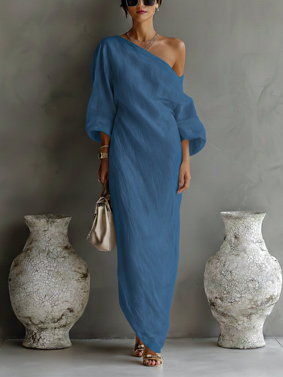 Festliches Damen Maxi Kleid mit einem dramatischen, langen Volumen-Ärmel und elegantem One-Shoulder-Schnitt.