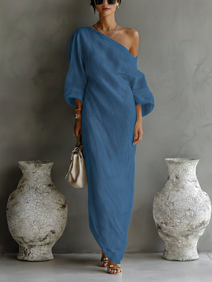 Festliches Damen Maxi Kleid mit einem dramatischen, langen Volumen-Ärmel und elegantem One-Shoulder-Schnitt.