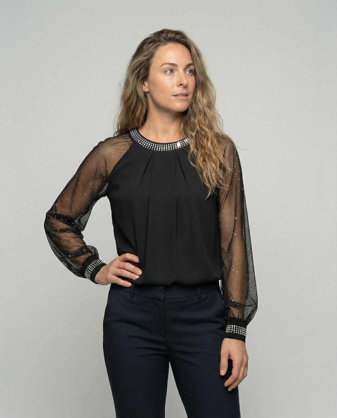 Modisches Damen Glitzer-Mesh-Top mit transparenten Langarm-Statement-Ärmeln für Party & Abendmode.