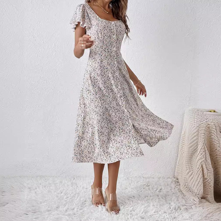 Weißes Damen Frühlings-/Sommerkleid, Midi-Länge, mit Blümchenmuster, quadratischem Ausschnitt und A-Linie.
