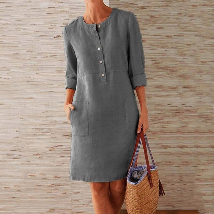 Lässiges Damen Midi Sommerkleid mit Knopfleiste, 3/4 Ärmeln und praktischen Seitentaschen für Damen.