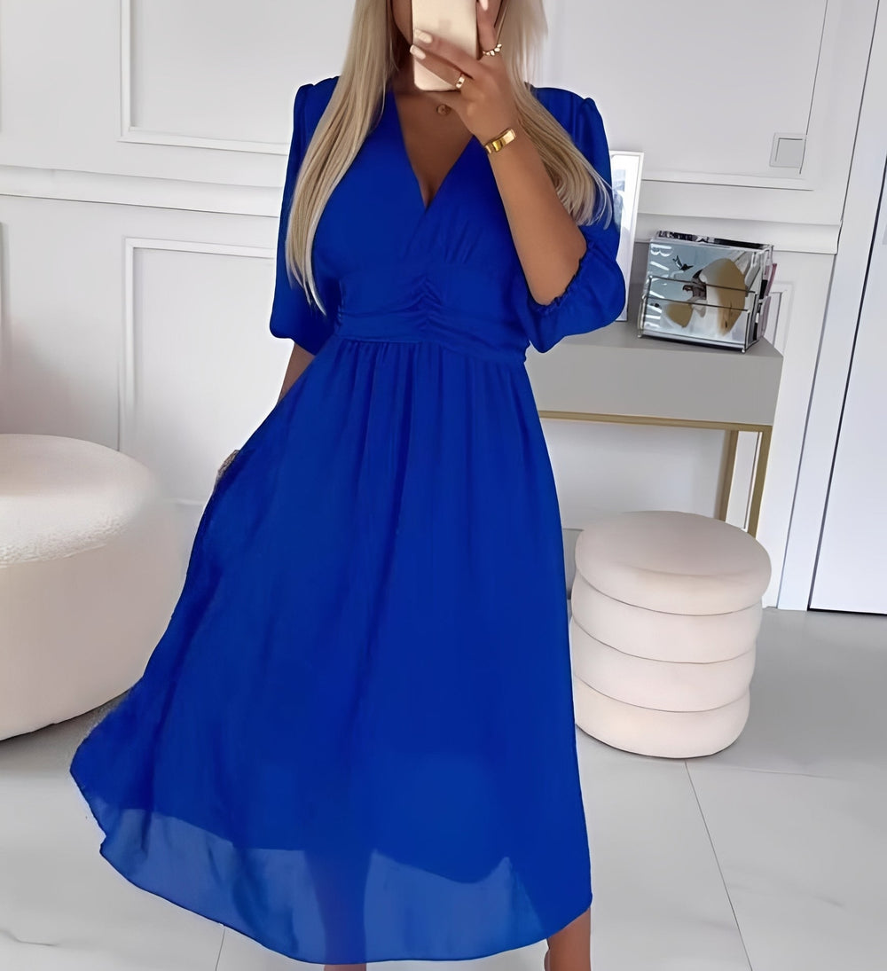 Rosa Damen Midikleid, elegant mit Puffärmeln und geraffter Taille, perfekt als Cocktail- oder Abendkleid.