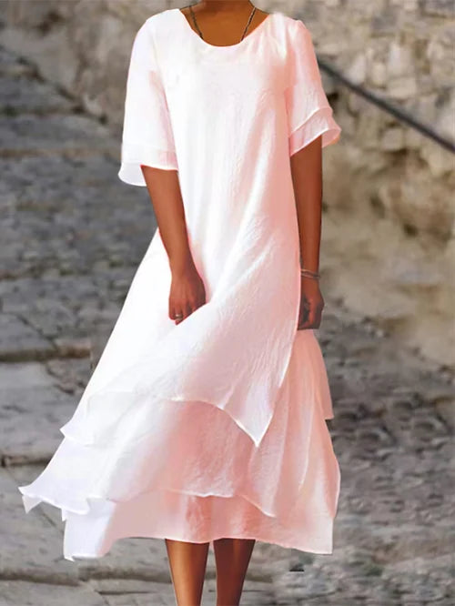 Lässiges Damen Sommerkleid A-Linie, kurzarm. Midi Strandkleid mit doppellagigem Saum in Weiß/Rosa für Freizeit.