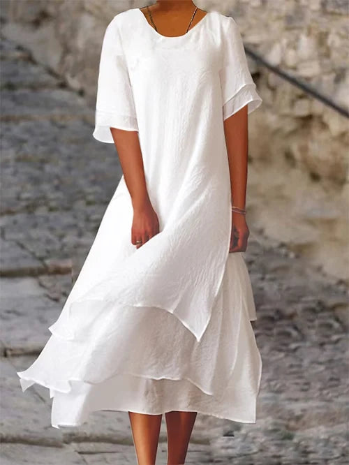 Elegantes Damen Midikleid mit doppellagigem Saum in A-Linie. Kurzarm Sommerkleid in Weiß oder Rosa, lässig & chic.