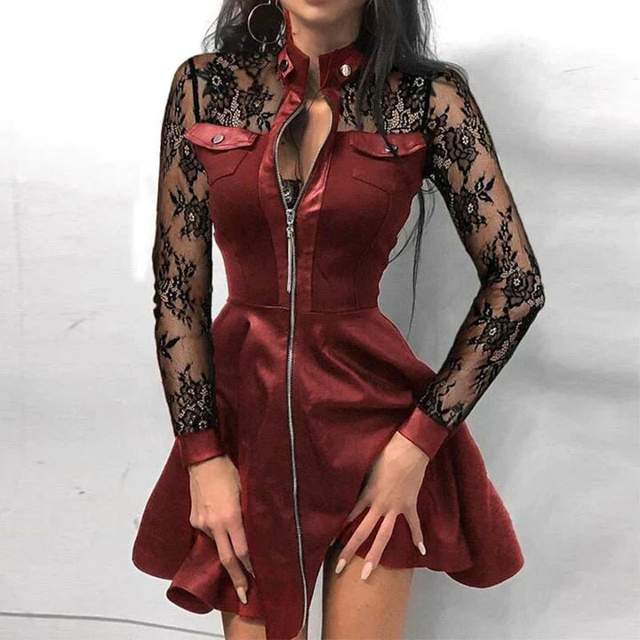 Sophistisches Damenkleid, figurbetont und elegant, mit auffälligem Frontreißverschluss für stilvolle Auftritte.