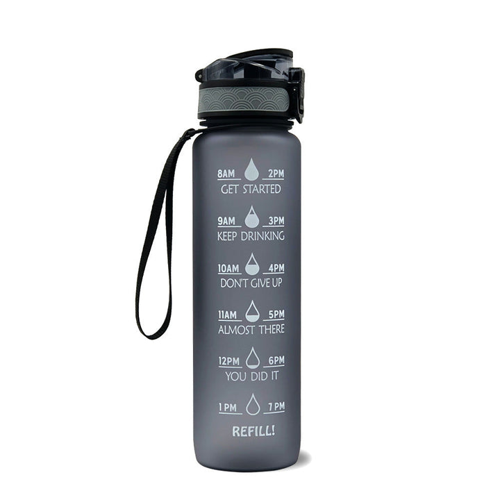 Große Trinkflasche 1 Liter mit Zeitstempeln für konstante Wasserzufuhr den ganzen Tag.