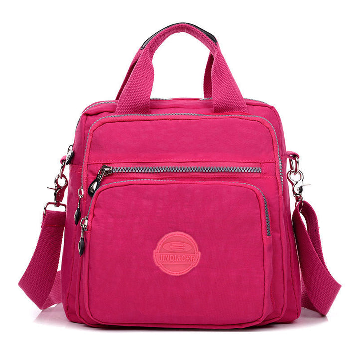 Wasserfeste Nylon Damen Tasche: FlexiBag als 3-in-1 Schultertasche, Rucksack oder elegante Umhängetasche.