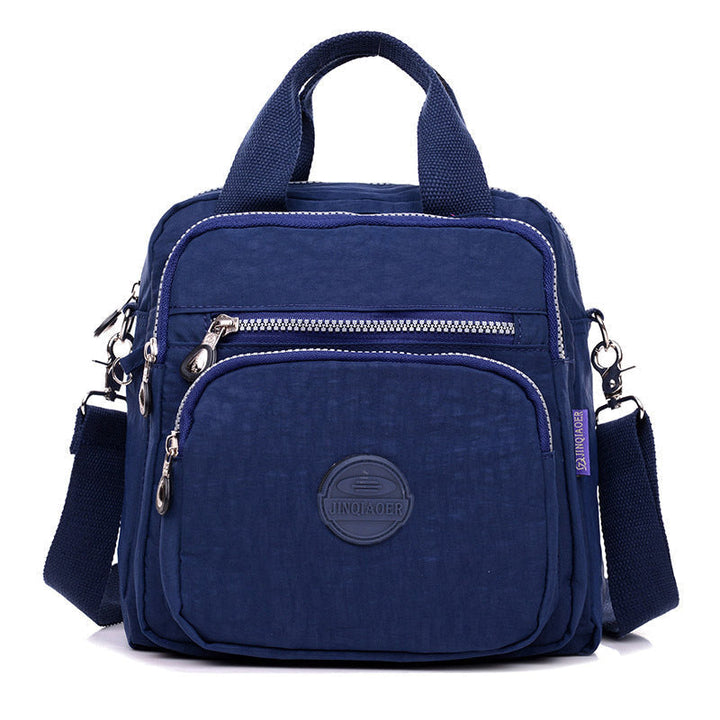 Trendige Damen Rucksack-Umhängetasche: Wasserfeste 3-in-1 Nylon Tasche, flexibel als Schultertasche nutzbar.