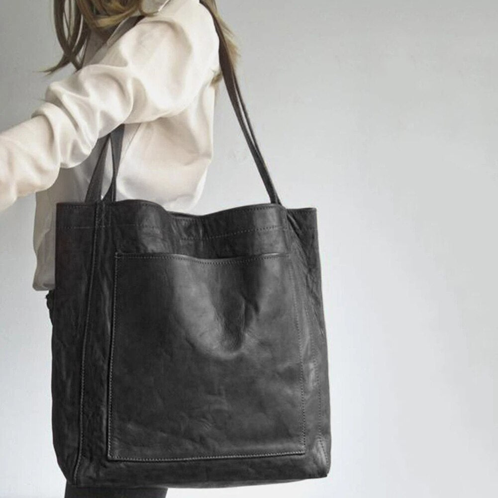 Klassische Isabella Damen Handtasche aus hochwertigem Leder in Kaffeebraun, zeitloses Design für Eleganz.