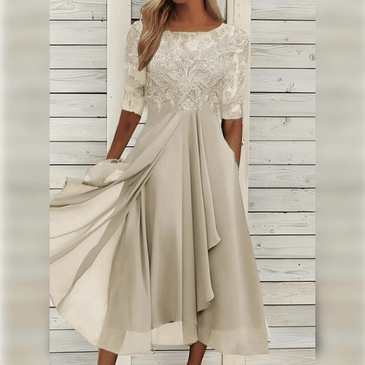 Fließendes lila Midi-Abendkleid für Damen, elegant und komfortabel, perfekt für stilvolle Auftritte im Herbst.