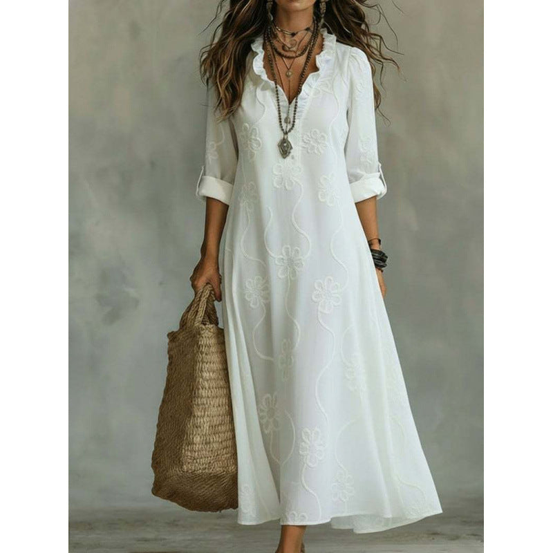 Stofftextur des langen Boho Maxikleides für Damen. Leichter Stoff & feine Blumenstickerei für angenehmen Tragekomfort.