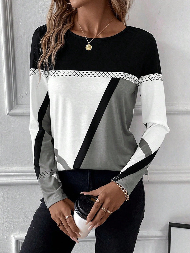 Damen Langarmshirt mit geometrischem Blockprint in zeitlosem Design, Rundhals.